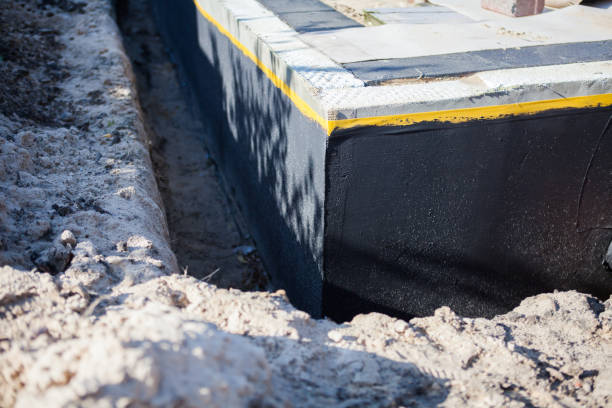 Professional Exterior Waterproofing technician working in Clarksville, VA